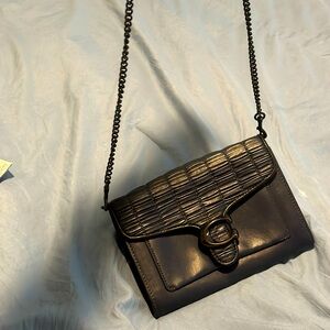 Dark blue Sling bag/purse leather Coach, preloved. In a good condition